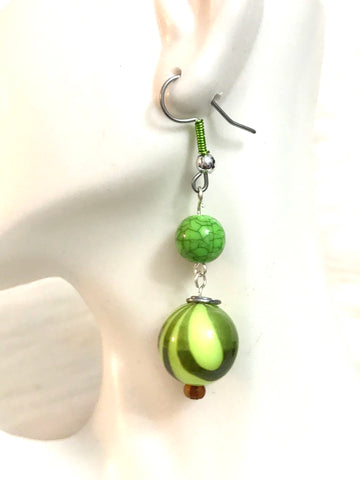 Green beaded dangle earrings