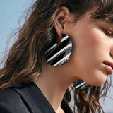 Oversized statement earrings